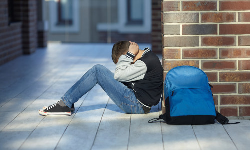 Schoolboy,Crying,In,The,Hallway,Of,The,School,,Negative,Emotion