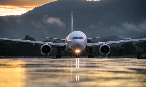 The,Commercial,Airplane,Standing,On,The,Airport,Taxiway,Or,Apron