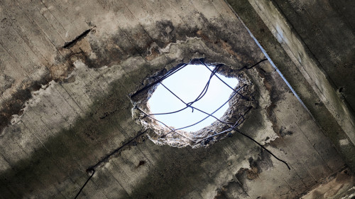 Vintage,Abandoned,Damaged,House,Roof,With,Hole,In,Ceiling,Overlooking