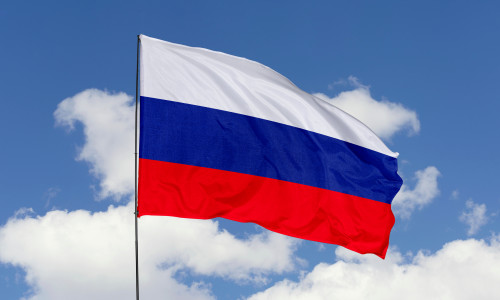 Russia,Flag,Isolated,On,The,Blue,Sky,With,Clipping,Path.