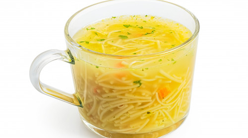 Instant,Chicken,Noodle,Soup,In,A,Glass,Mug,Isolated,On