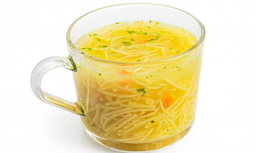 Instant,Chicken,Noodle,Soup,In,A,Glass,Mug,Isolated,On