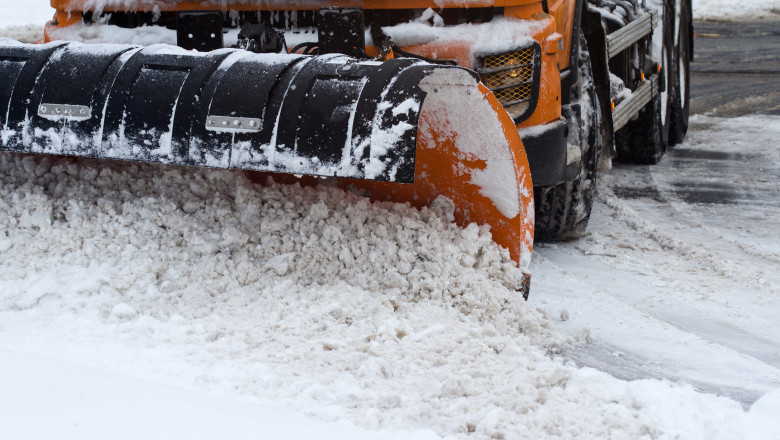 Front,View,Of,An,Orange,Snow,Plug,Working,On,A