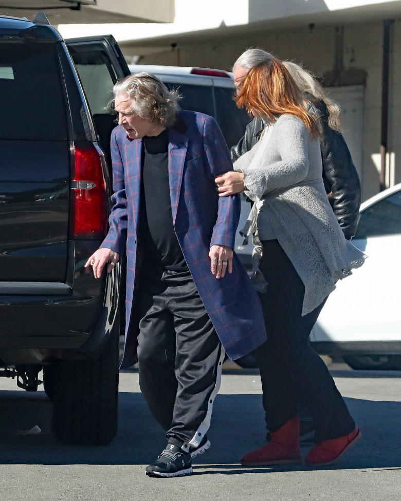 *EXCLUSIVE* Ozzy Osbourne appears very frail and tired as he is seen leaving LA fitness center after shooting mega-bucks Super Bowl commercial