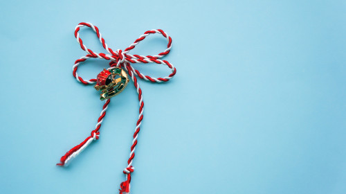 Horseshoe,And,Ladybug,Martisor,On,Blue,Background.,Martisor,Is,A