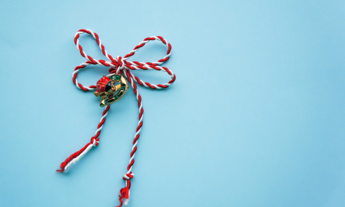 Horseshoe,And,Ladybug,Martisor,On,Blue,Background.,Martisor,Is,A