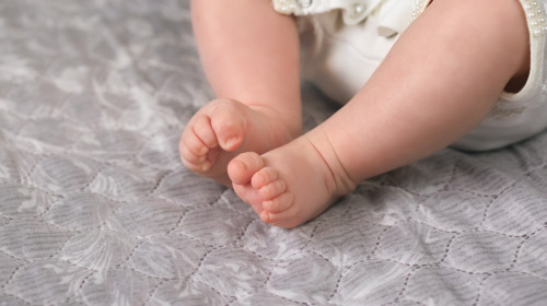 Adoption,Of,The,Newborn.,Legs,Baby,Closeup.,Lonely,Little,Abandoned