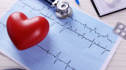 Cardiogram,With,Stethoscope,And,Red,Heart,On,Table,,Closeup