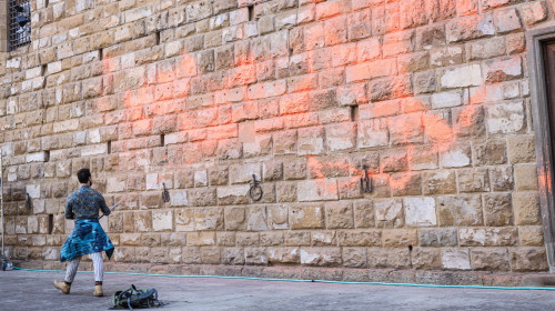 Italy, Florence: Members of Ultima Generazione, Last Generation climate civil-disobedience group, spray paint over Palazzo Vecchio next to the David masterpiece of Renaissance sculpture created by the Italian artist Michelangelo Buonarroti