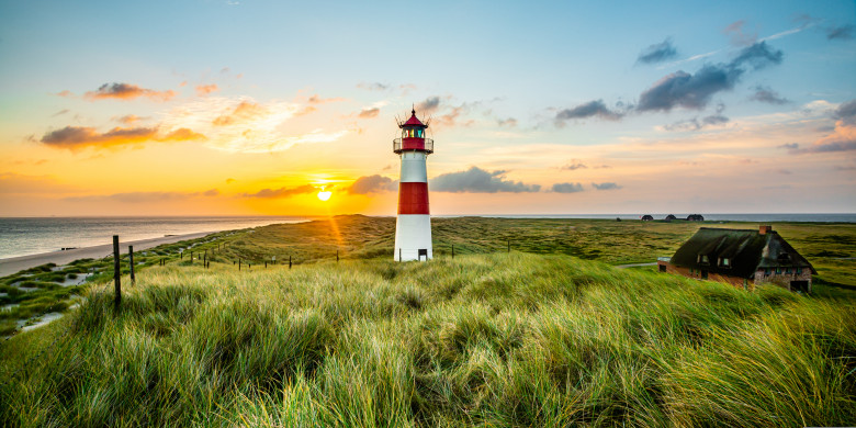 Sunrise,At,Lighthouse,In,List,On,The,Island,Of,Sylt,