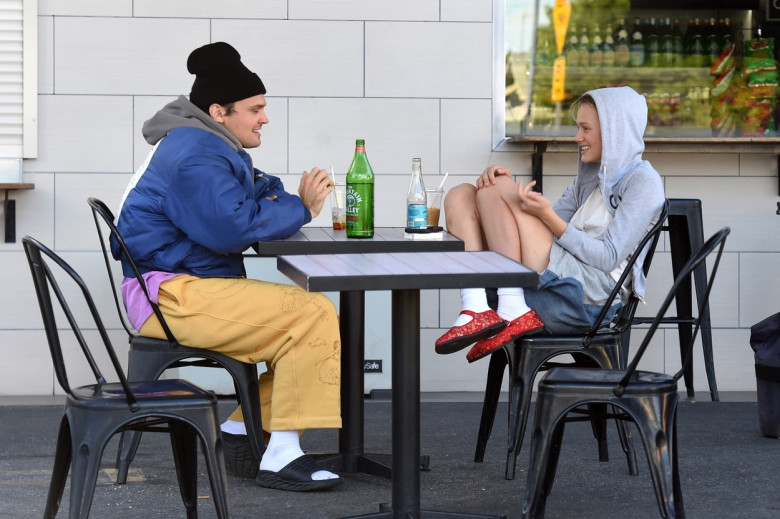 *EXCLUSIVE* Ray Nicholson is all laughs as he chats with a mystery woman over lunch!