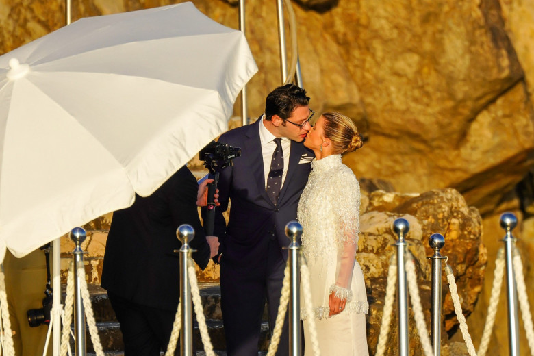 Blushing bride Sofia Richie looks radiant in an elegant white gown as she celebrates her lavish wedding weekend in the French Riviera.