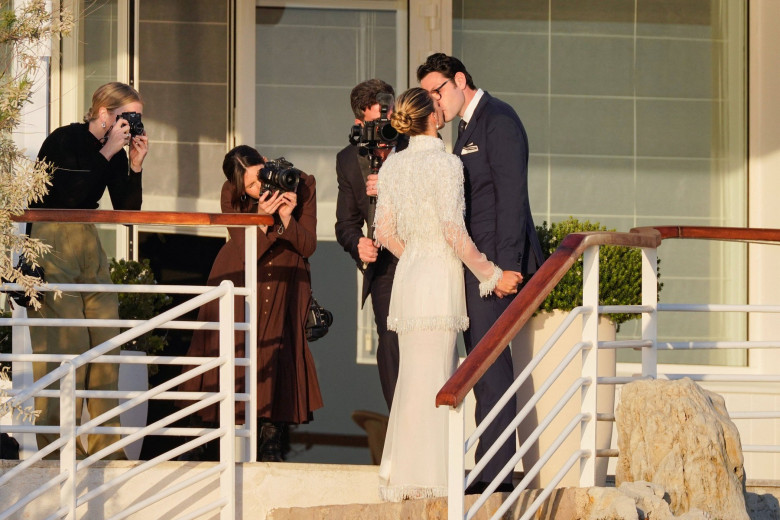 Blushing bride Sofia Richie looks radiant in an elegant white gown as she celebrates her lavish wedding weekend in the French Riviera.