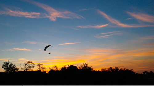 Sunset,On,The,Field,With,Skydive