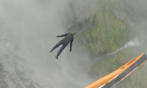 Tom Crusie reveals how he pulled off a stunning Mission Impossible cliff jump stunt in a new behind-the-scenes mini movie