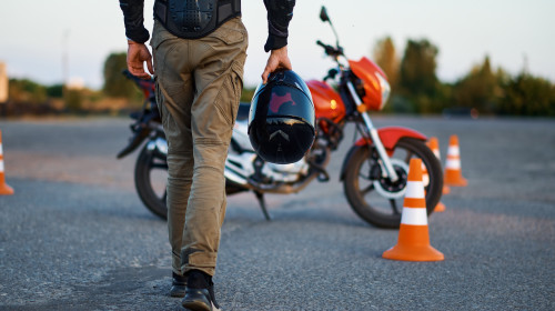 Male,Person,Holds,Helmet,,Motorcycle,School