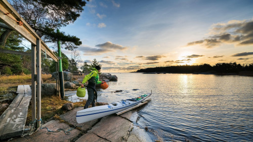 Packing a kayak at Ulko-Tammio island, Hamina, Finland