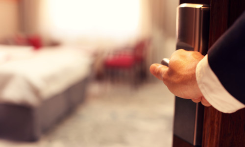 Picture,Showing,Hand,Of,Businessman,Opening,Hotel,Room