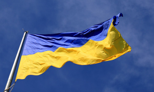 Ukraine,Flag,Large,National,Symbol,Fluttering,In,Blue,Sky.,Large