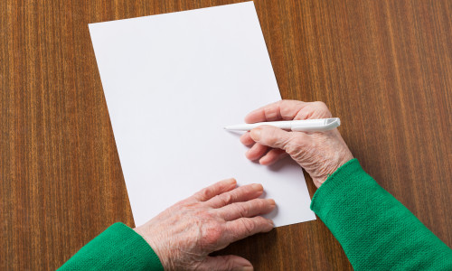 Hands,Of,An,Old,Woman,With,A,Sheet,For,Writing
