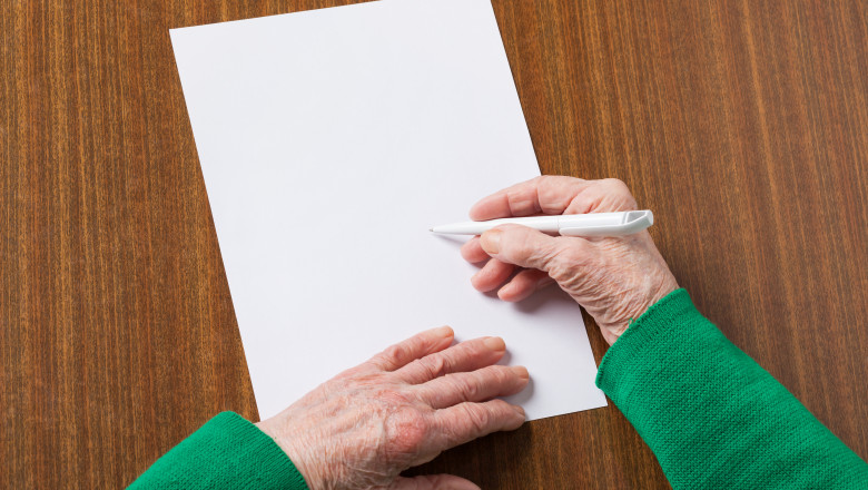 Hands,Of,An,Old,Woman,With,A,Sheet,For,Writing