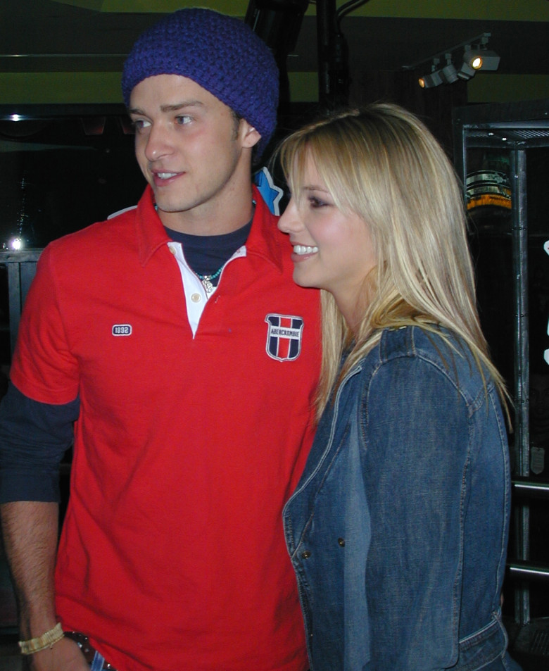 EXCLUSIVE: Britney Spears and Justin Timberlake watch Tom Brady's first Super Bowl in 2002 at Planet Hollywood NYC in these never-before-seen photographs.