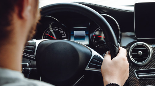 Portrait,Of,Handsome,Man,Going,For,A,Drive,With,Brand