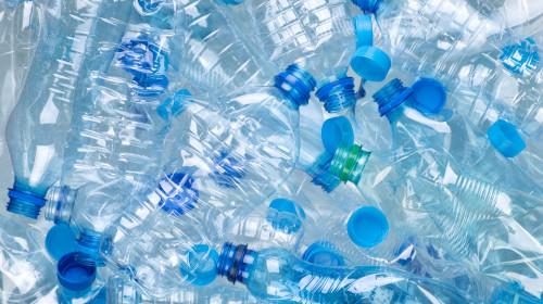 Plenty,Of,Plastic,Bottles,On,White,Background,Top,View