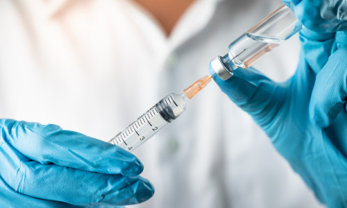 Doctor,,Nurse,,Scientist,,Researcher,Hand,In,Blue,Gloves,Holding,Flu,