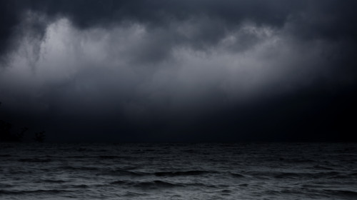 Abstract,Dark,Background.,Sea,Waves,Against,The,Black,Sky