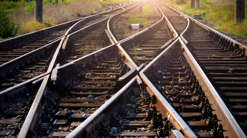 Train,Tracks,Leading,Into,The,Sunset