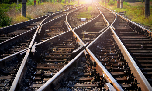 Train,Tracks,Leading,Into,The,Sunset
