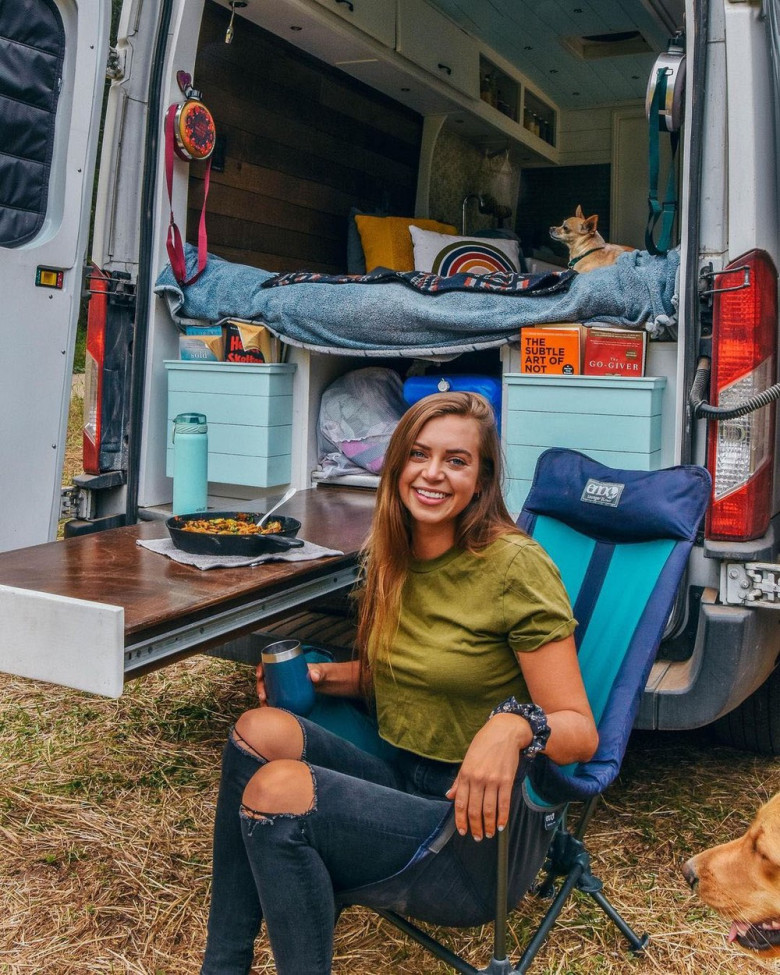 EXCLUSIVE: 'I Was Just So Tired All The Time': Woman, 26, Who Used To Work '70 Hours Per Week' Quits To Live Life On The Open Road In A Van With Her Two Dogs Spending Just $14,000 In Total