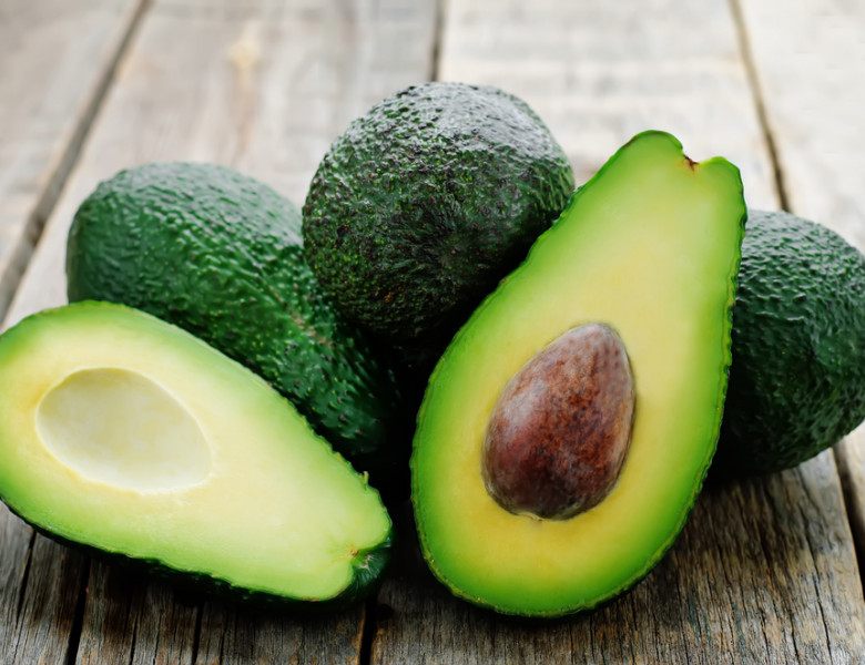 Avocado,On,A,Dark,Wood,Background.,Tinting.,Selective,Focus