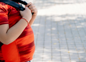 Childhood,Obesity,Concept.,Boy,With,School,Bag,With,Big,Belly.