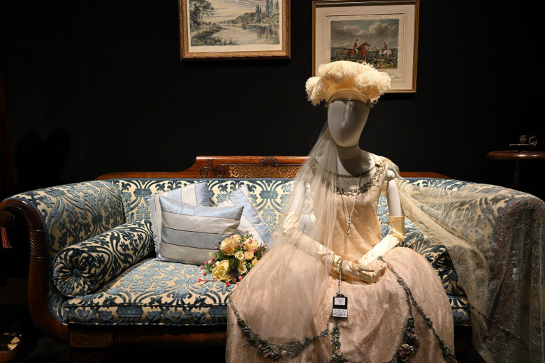 Lily James (as Lady Rose): Presentation pale pink lace costume and headdress - Downton Abbey The Auction - Bonhams central London