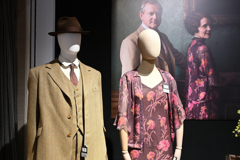 Hugh Bonneville (as Lord Grantham): Three-piece summer suit, Elizabeth McGovern (as Cora, Countess of Grantham): Floral day dress - Downton Abbey auction