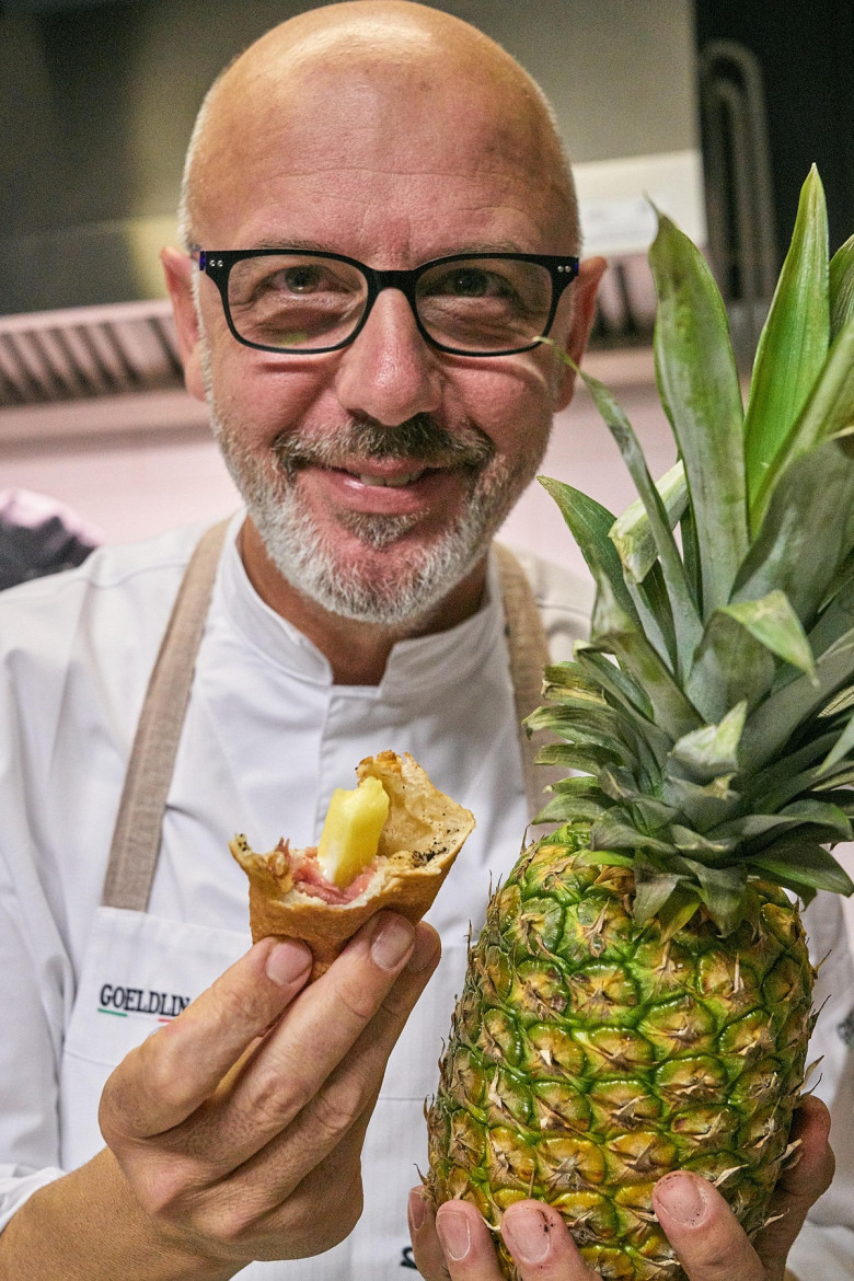 Franco Pepe, named the best pizza maker in the world, prepares a new fried pizza called "Ananascosta" in his pizzeria "Pepe in Grani" in Caiazzo, near Caserta, in southern Italy. Ananascosta is a new fried pizza with raw ham, pineapple served in a copper