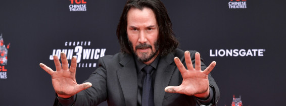 Keanu Reeves Places His Hand Prints In Cement At TCL Chinese Theatre IMAX Forecourt