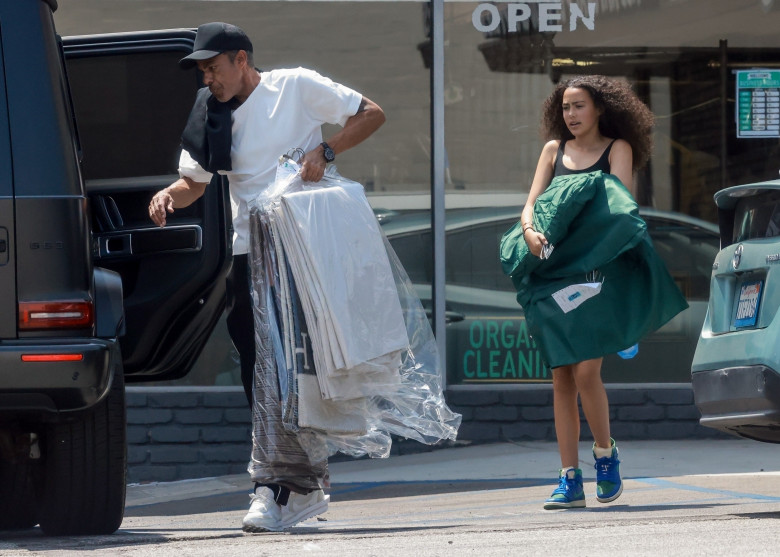 *EXCLUSIVE* Chris Ivery gets some help from his daughter Stella picking up the dry cleaning