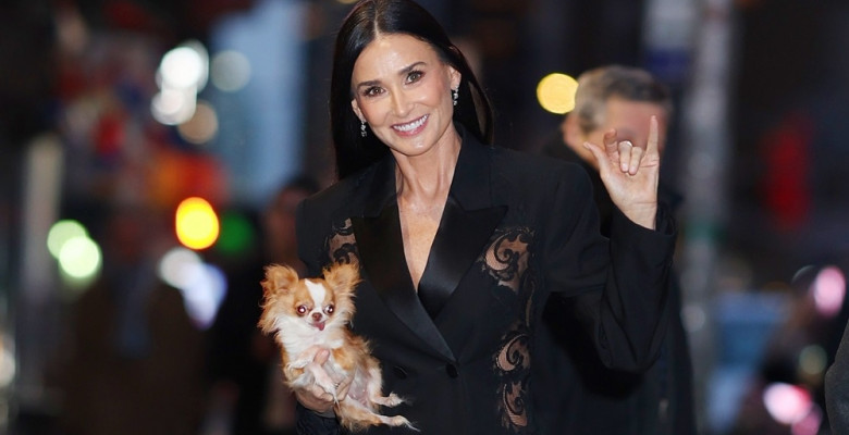 Demi Moore carries her pup Pilaf as she arrives to CBS studios in New York, NY