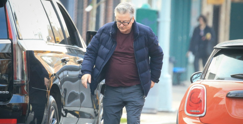 EXCLUSIVE: Alec Baldwin looks upbeat as he steps out with wife Hilaria one day after his 'Rust' shooting trial date is announced.