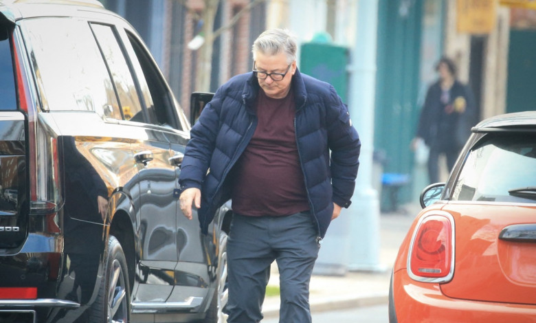 EXCLUSIVE: Alec Baldwin looks upbeat as he steps out with wife Hilaria one day after his 'Rust' shooting trial date is announced.