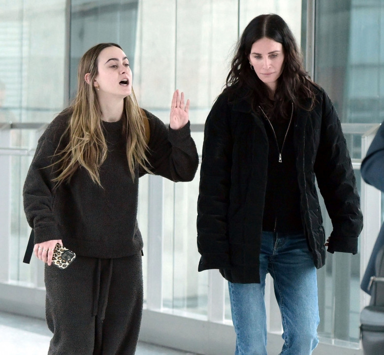 *EXCLUSIVE* Friends American actress Courteney Cox and her daughter Coco Arquette are pictured arriving at Heathrow airport, Mother and daughter seemed to be having an animated conversation.