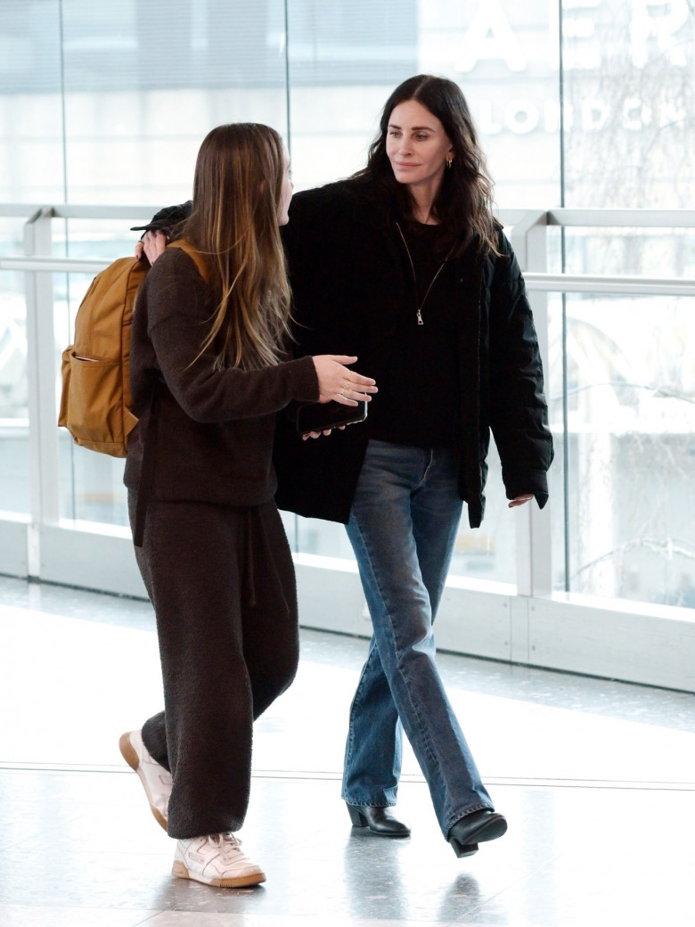*EXCLUSIVE* Friends American actress Courteney Cox and her daughter Coco Arquette are pictured arriving at Heathrow airport, Mother and daughter seemed to be having an animated conversation.