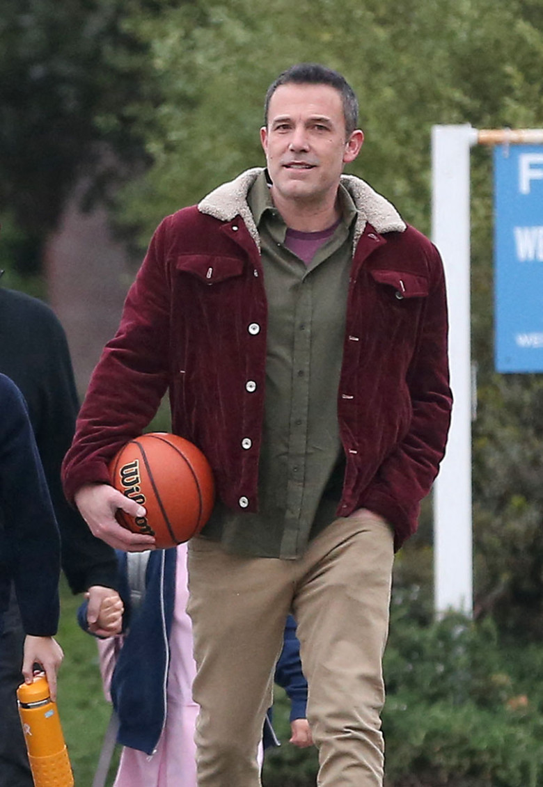 A clean shaved Ben Affleck is seen out for his morning walk with his son Samuel