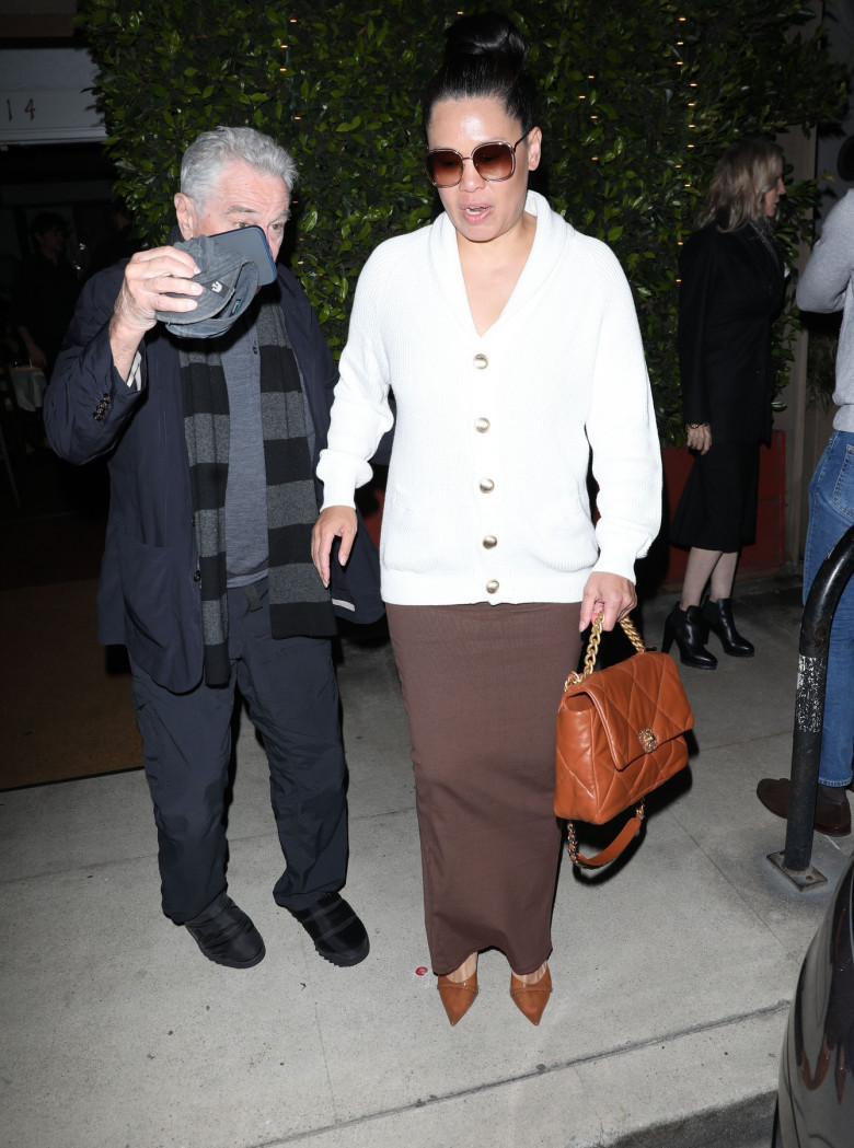Robert De Niro And Tiffany Chen Exit Giorgio Baldi Italian Eatery in Santa Monica