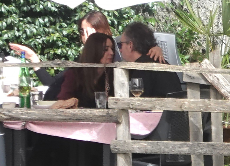 *EXCLUSIVE* WEB MUST CALL FOR PRICING  - Monica Bellucci and Tim Burton pack on the PDA as they enjoy a little fine Italian dining during their romantic trip to Calcata.*PICTURES TAKEN ON 30/03/2024*