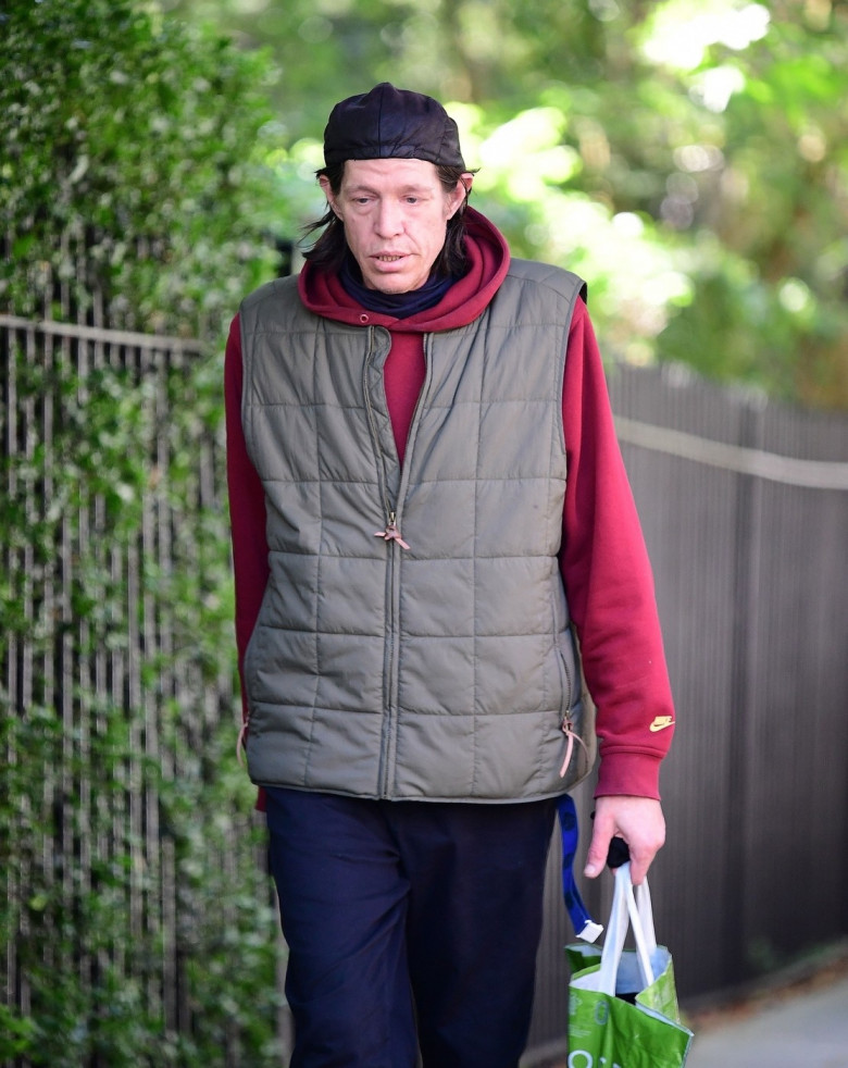 *EXCLUSIVE* Christopher Brosnan is spotted on a stroll holding his Waitrose bag out shopping on the Portobello Road in London's Notting Hill.