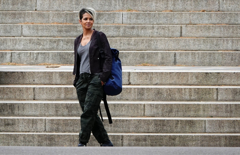 The American Actors Halle Berry and Mark Wahlberg are pictured out on location in London's Hyde Park filming scenes for the new Netflix film 'Our Man From Jersey'.